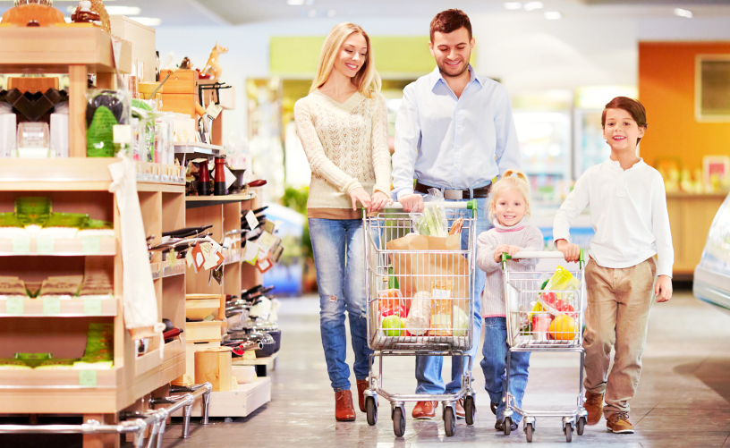 happy family in supermarket